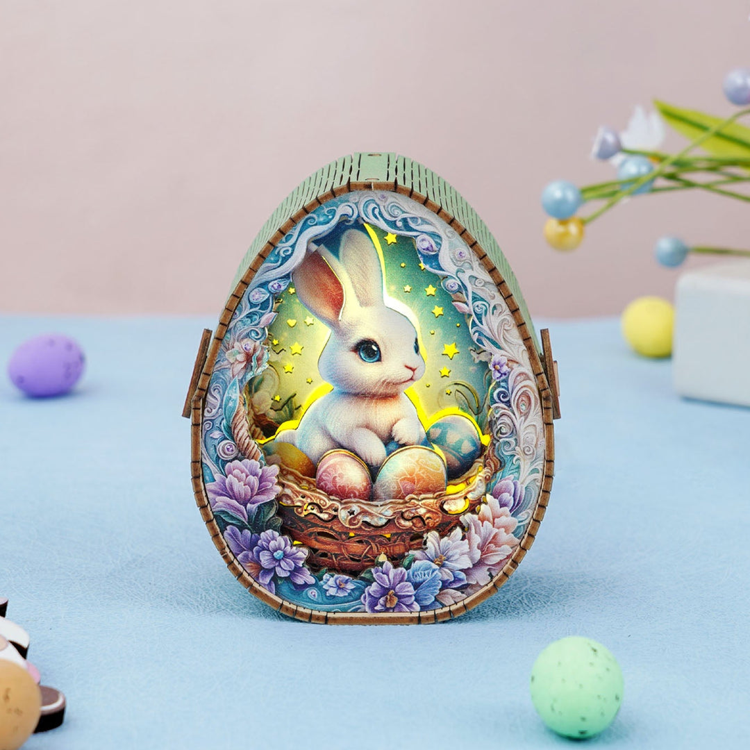Colorful 3D wooden puzzle depicting a bunny with Easter eggs in a decorated basket, perfect for festive décor.