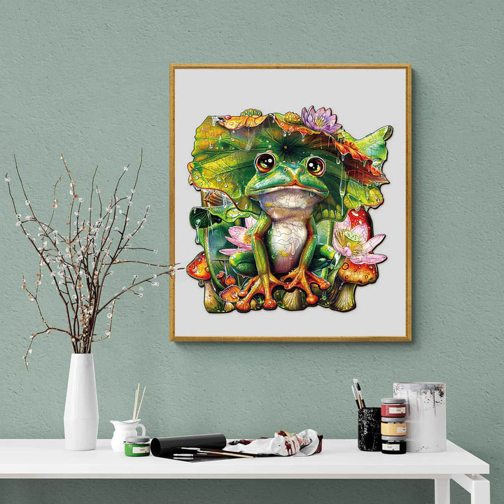 Vibrant frog illustration with leaves and flowers in a stylish room setting, perfect for nature lovers and decor enthusiasts.