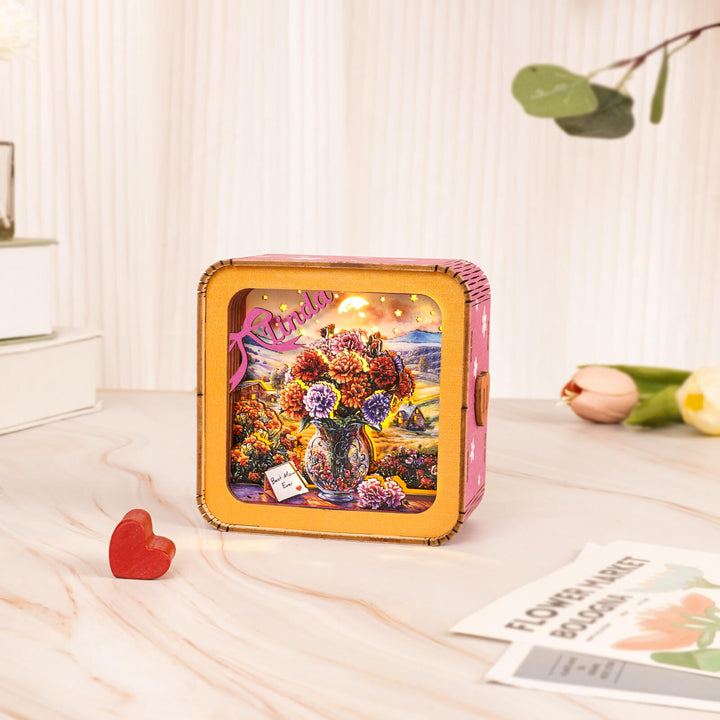 Colorful 3D wooden puzzle night light kit featuring blossoms in a vase, perfect for Mother's Day gifting.