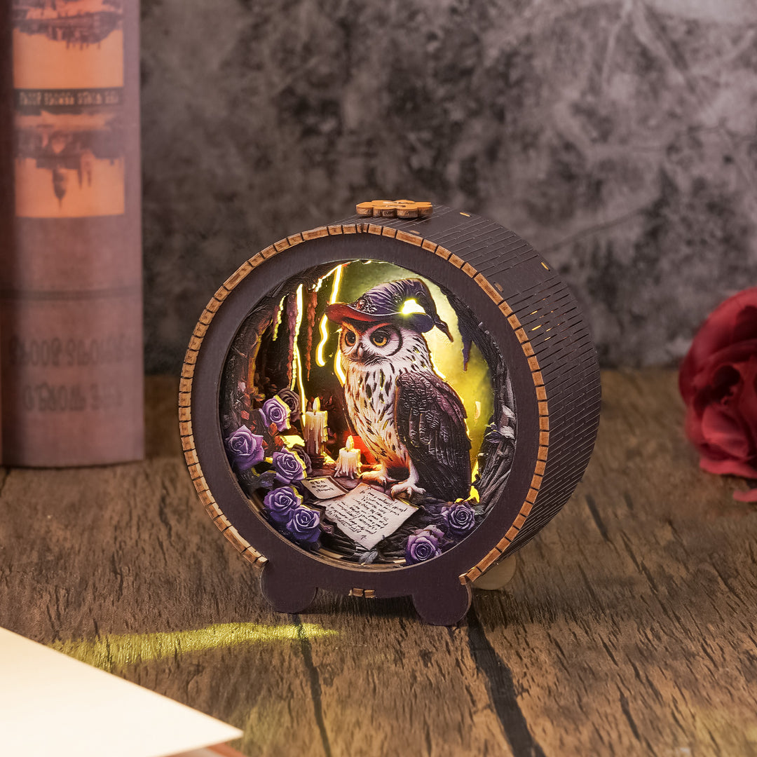 Owl wizard night light 3D wooden puzzle with candles and roses, creating a mystical atmosphere.
