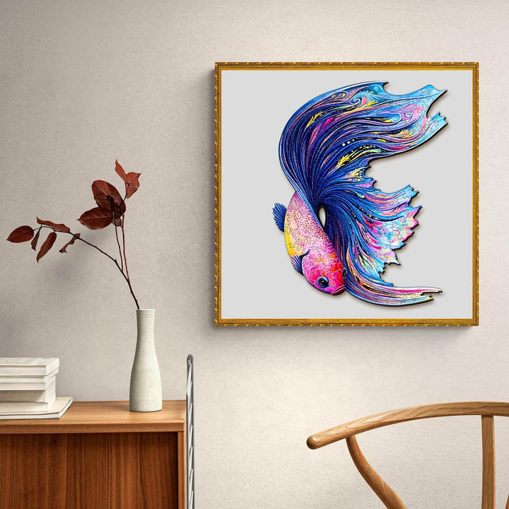 Colorful framed artwork of a Half Moon Betta fish, vibrant design showcasing intricate details on a beige wall.