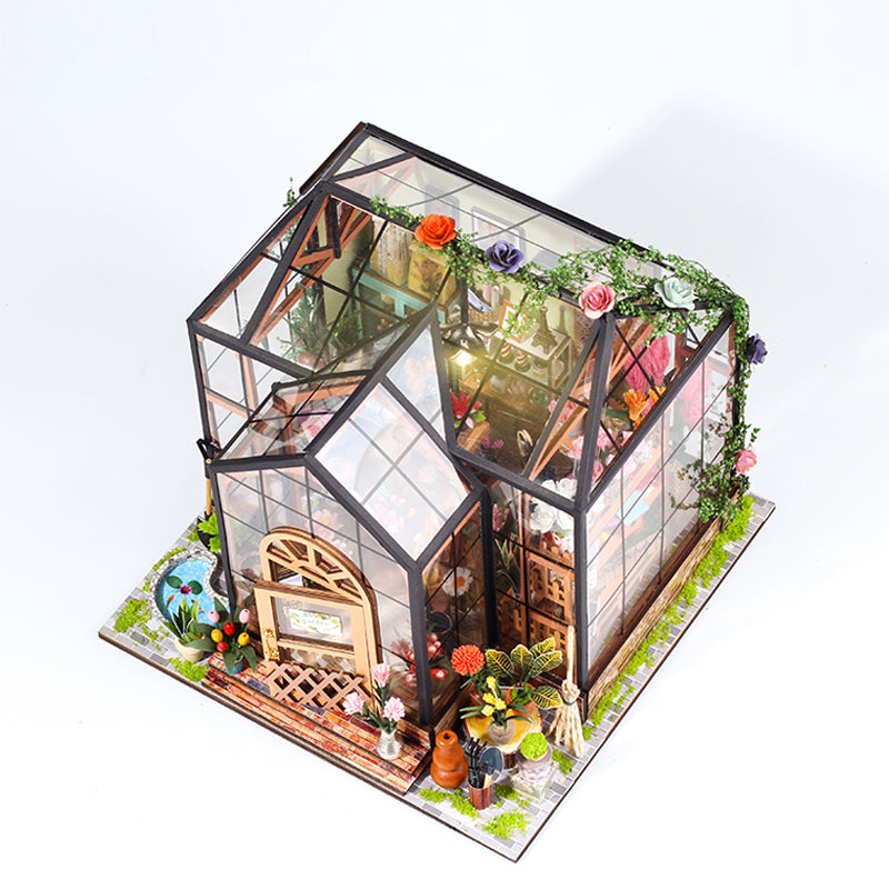 Jenny's Greenhouse DIY dollhouse kit, 3D wooden puzzle with intricate design and colorful decorations.