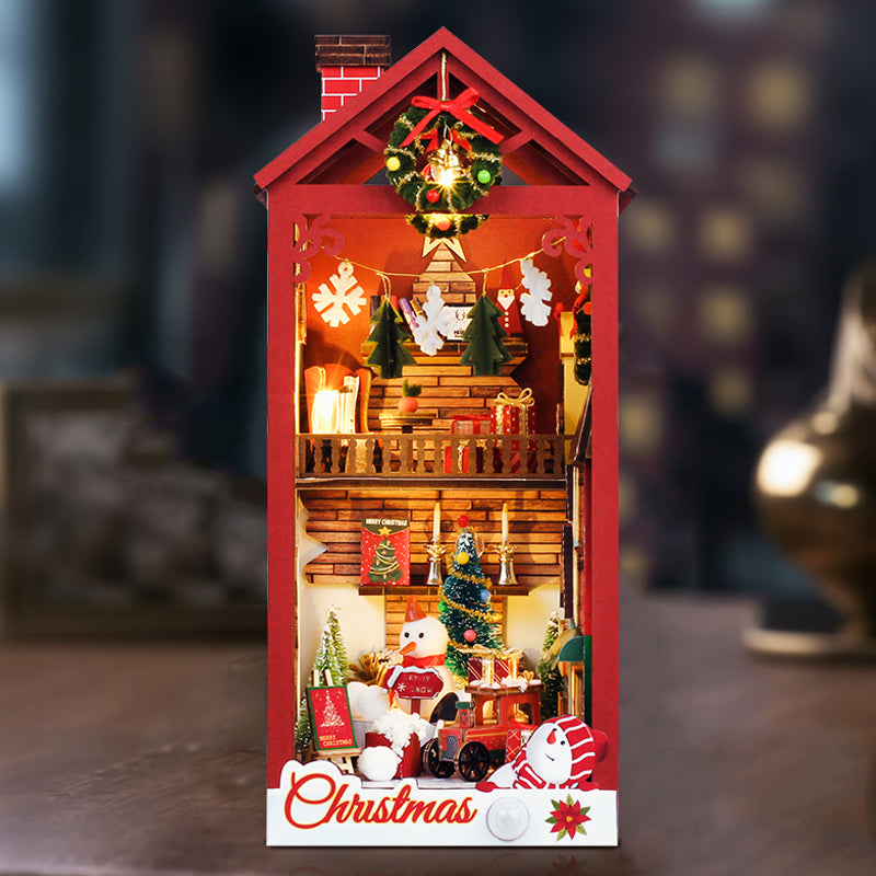 Merry Christmas DIY Book Nook Kit, a 3D wooden puzzle with festive lights and decorations.