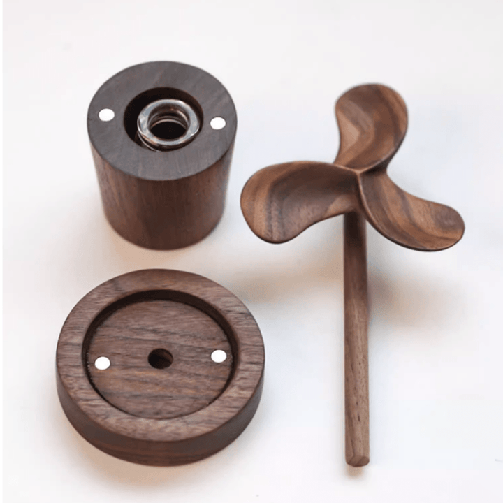 Walnut wooden aromatherapy diffuser parts, including base, oil chamber, and flower-shaped diffuser stick.