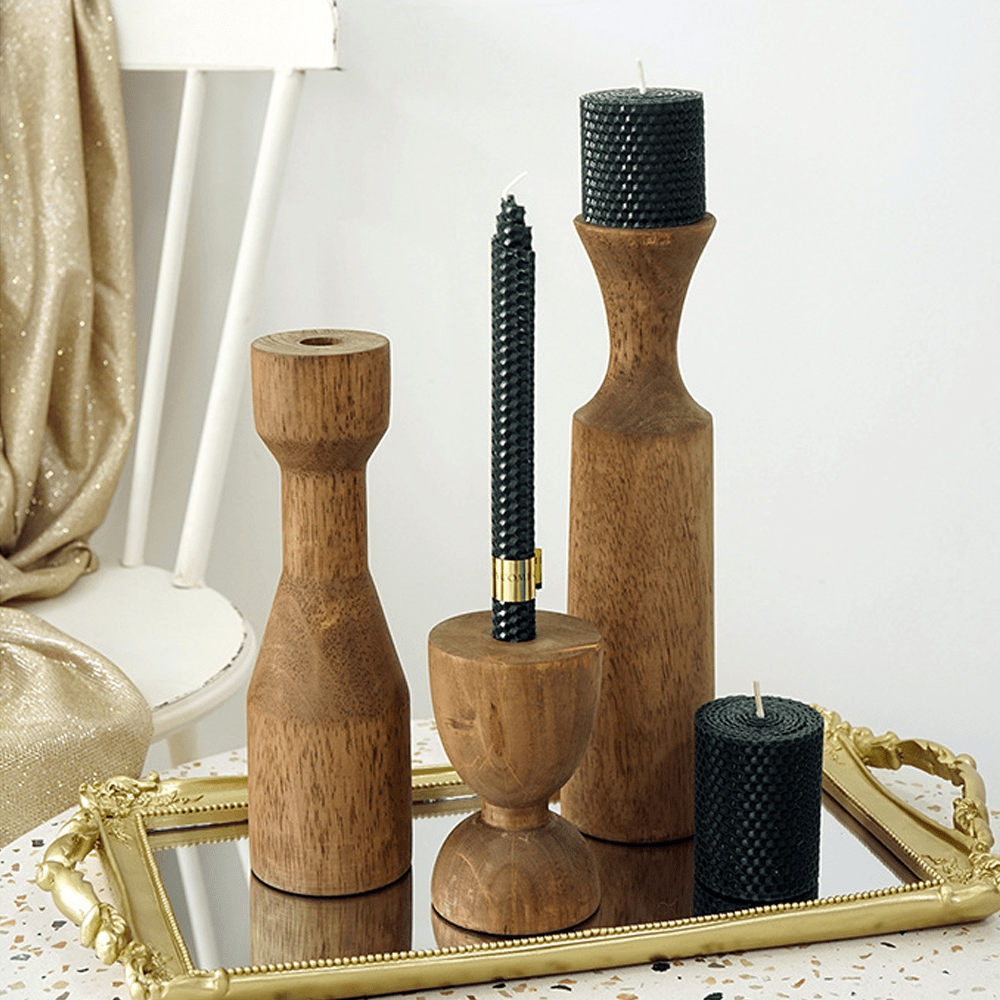 American retro wooden candle holders with black candles, elegantly displayed on a mirror tray.
