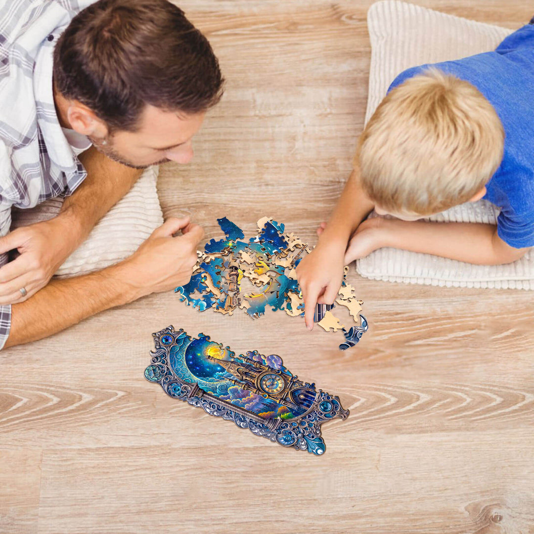 Father and son engaged in solving Moonlit clock tower wooden jigsaw puzzle on a cozy floor mat.