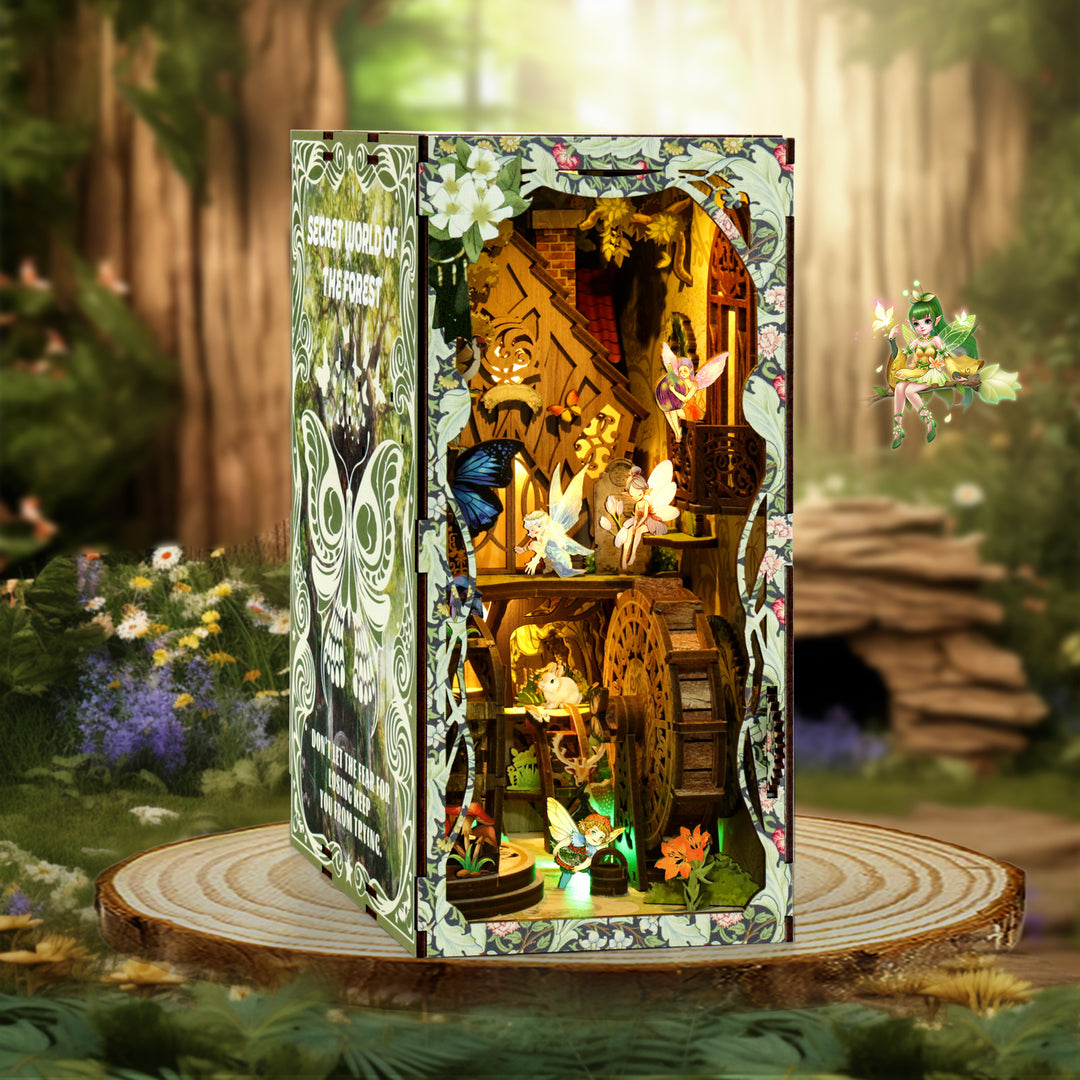 Secret Forest DIY Book Nook Kit with fairy decorations, intricate wooden design, and illuminated musical elements.