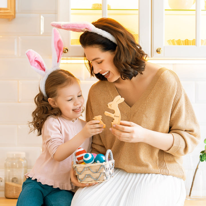 Mom and daughter celebrating with Easter bunny puzzles and colorful eggs in a cozy kitchen setting.