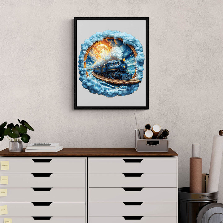 Framed artwork of a vintage steam locomotive emerging from clouds with a glowing sunset in the background.