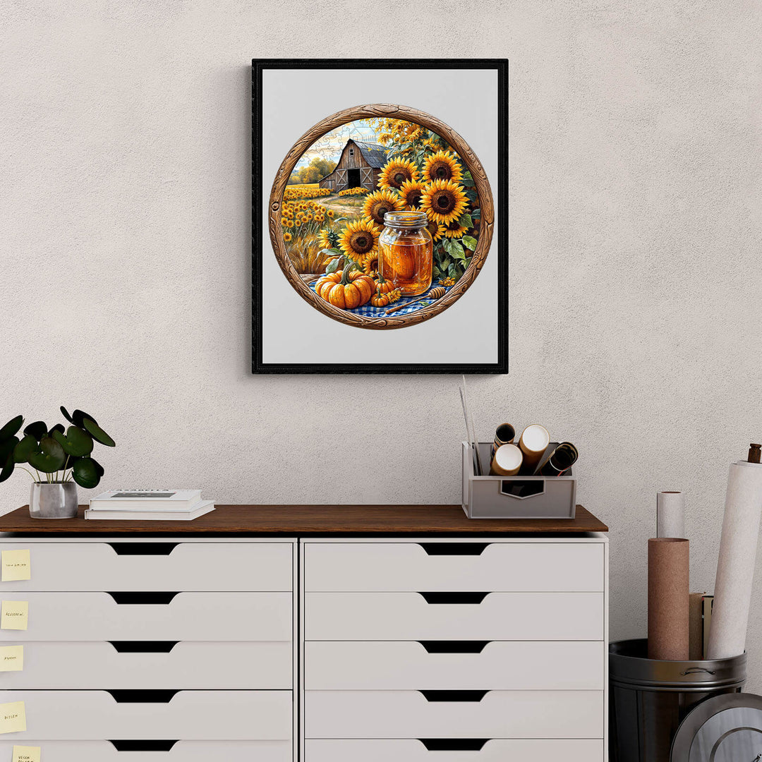 Vibrant artwork featuring sunflowers, pumpkins, and a mason jar in a rustic setting on a modern desk.