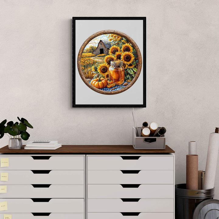 Vibrant artwork featuring sunflowers, pumpkins, and a mason jar in a rustic setting on a modern desk.