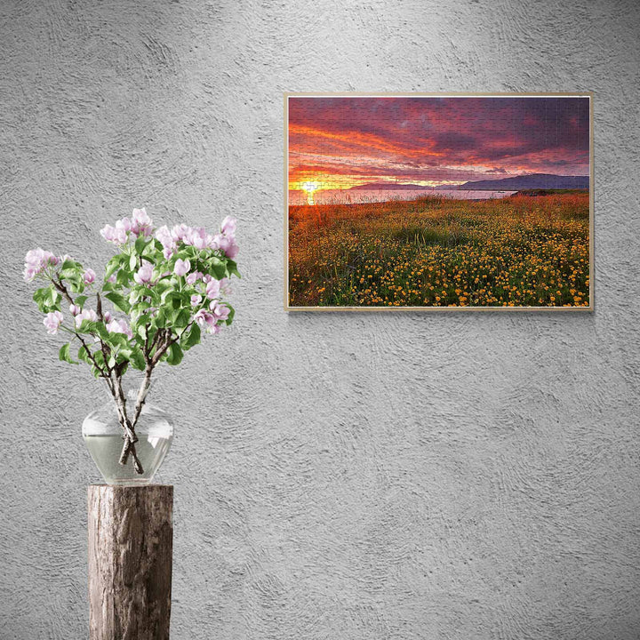 Lakeside Sunset 500/1000 piece puzzle showcased in a home decor setting with flowers.