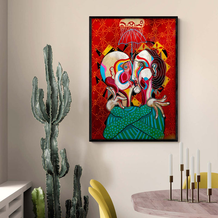 A Moment in Time by artist Dylan Gill, featuring colorful abstract figures against a vibrant red backdrop.