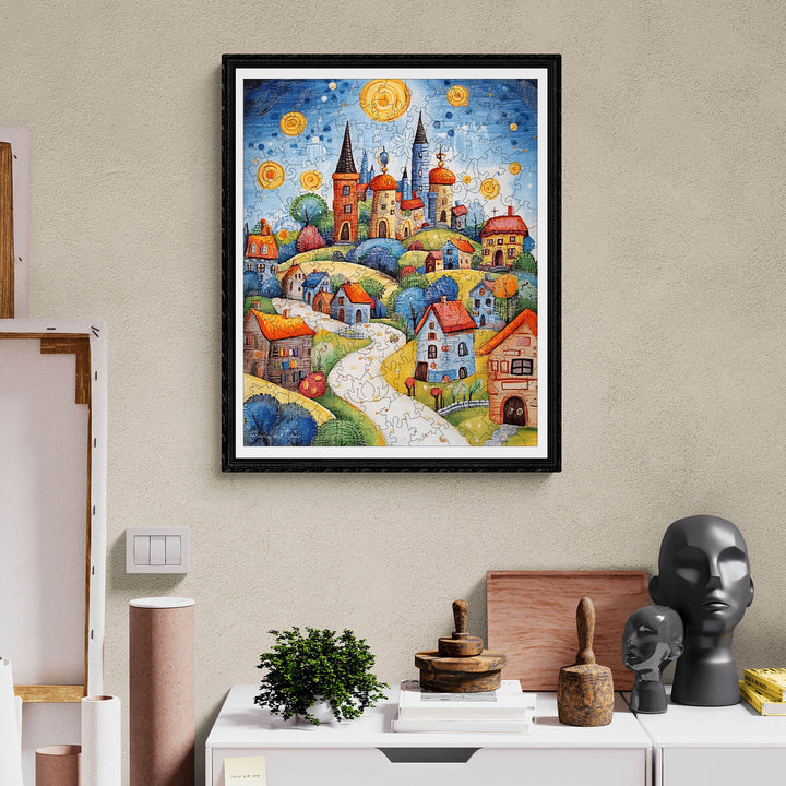Colorful village artwork by Pietro Gallo, featuring whimsical houses and a starry night sky.