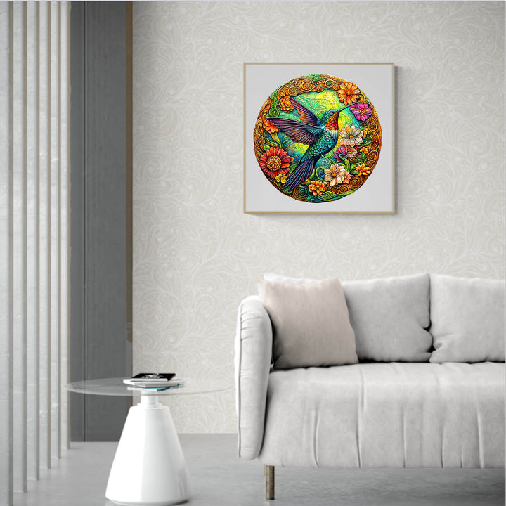Colorful vintage hummingbird artwork featured in a modern living room setting with a cozy couch.