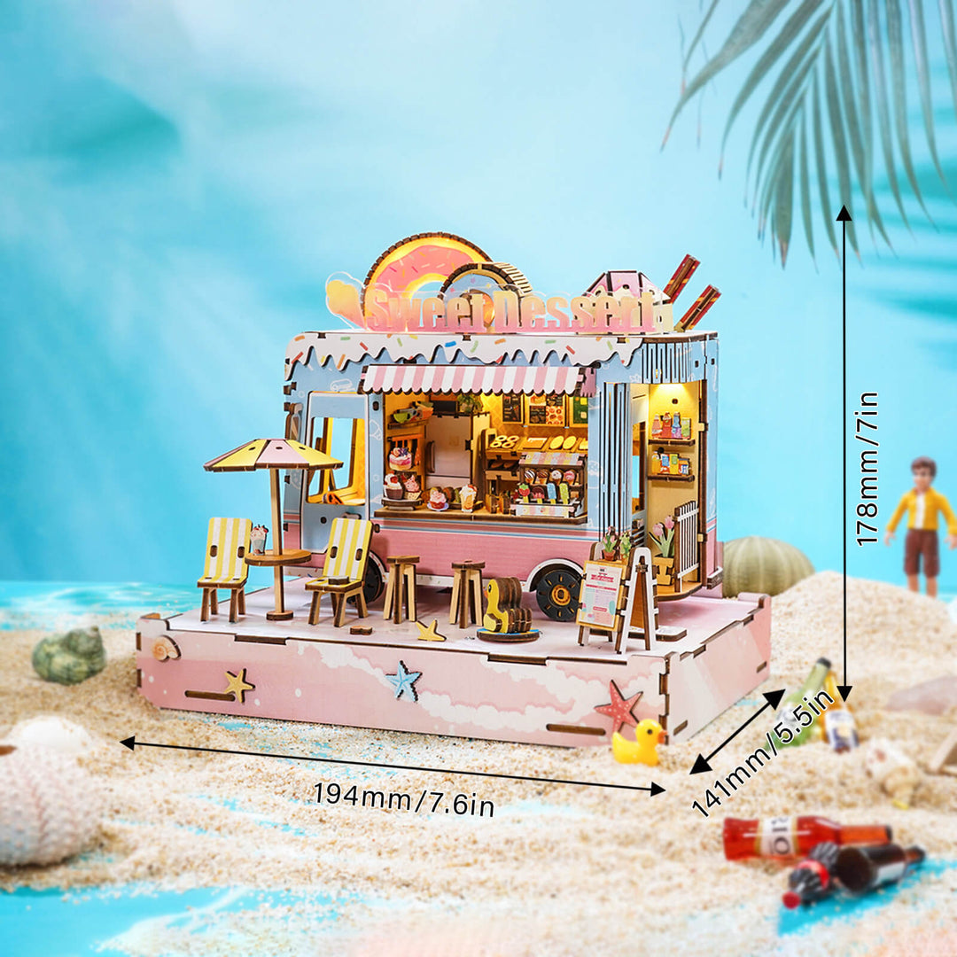 Miniature dessert cart 3D wooden puzzle kit on a sandy beach with palm trees, showcasing detailed design elements.