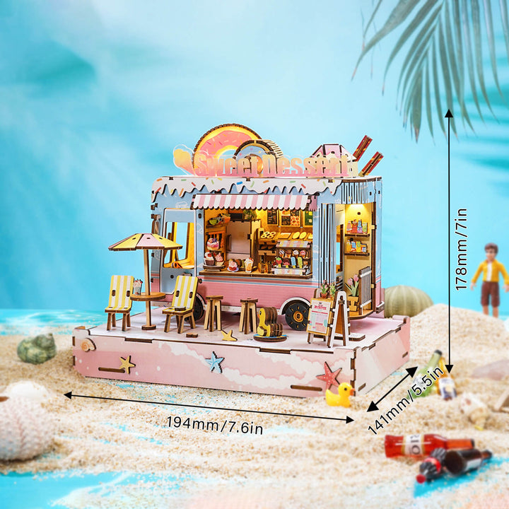 Miniature dessert cart 3D wooden puzzle kit on a sandy beach with palm trees, showcasing detailed design elements.
