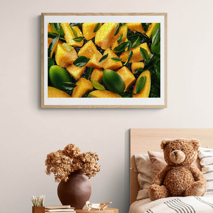 Framed image of fresh mangoes and green leaves on a wall, enhancing a cozy bedroom decor.