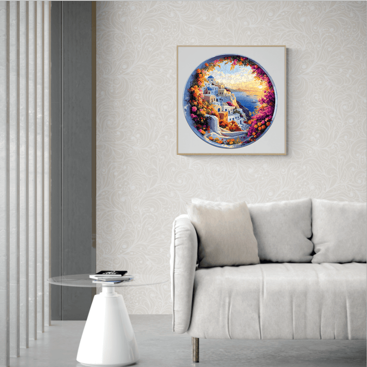Stylish living room with a Santorini-themed jigsaw puzzle artwork hanging above a modern sofa.