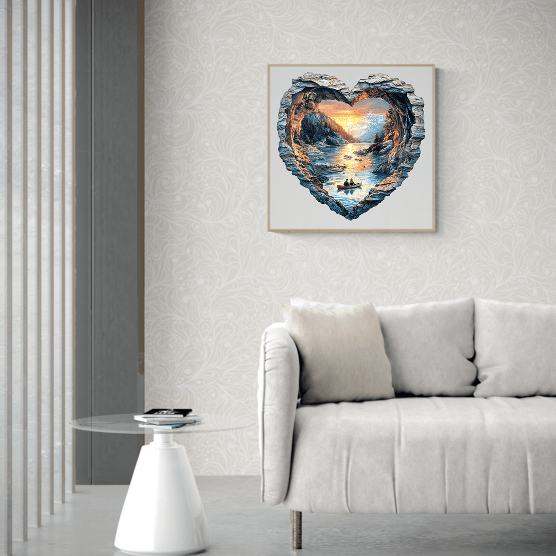 A heart-shaped artwork of Lake Louise, displayed above a cozy sofa in a stylish living room.