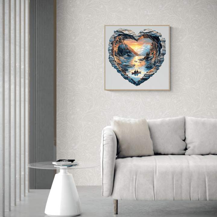 A heart-shaped artwork of Lake Louise, displayed above a cozy sofa in a stylish living room.