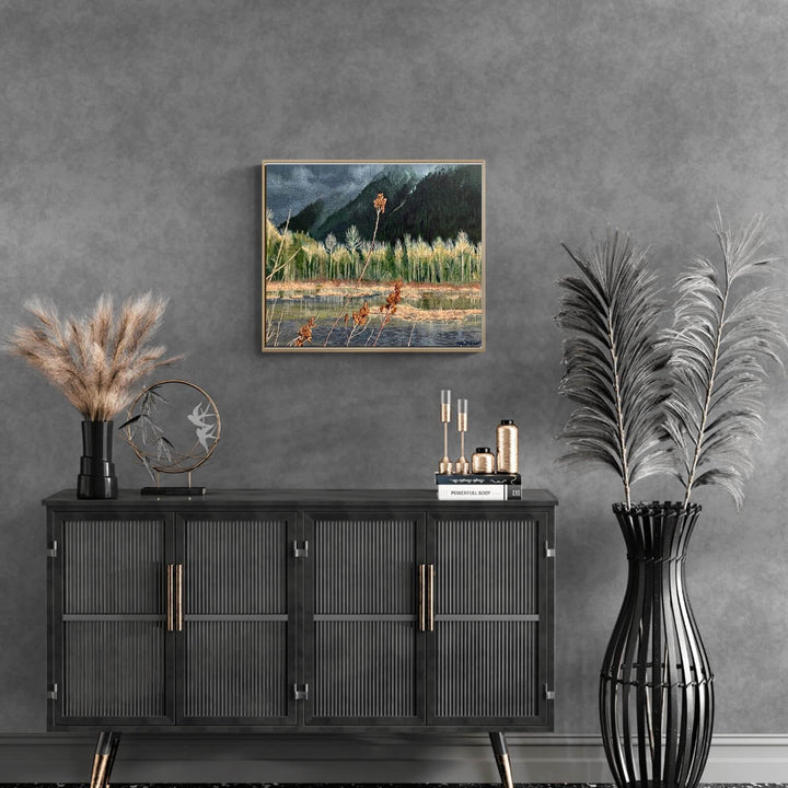 Framed painting 'Distant Storm' by Marianne K Palmer in a modern living room setting with decorative plants.