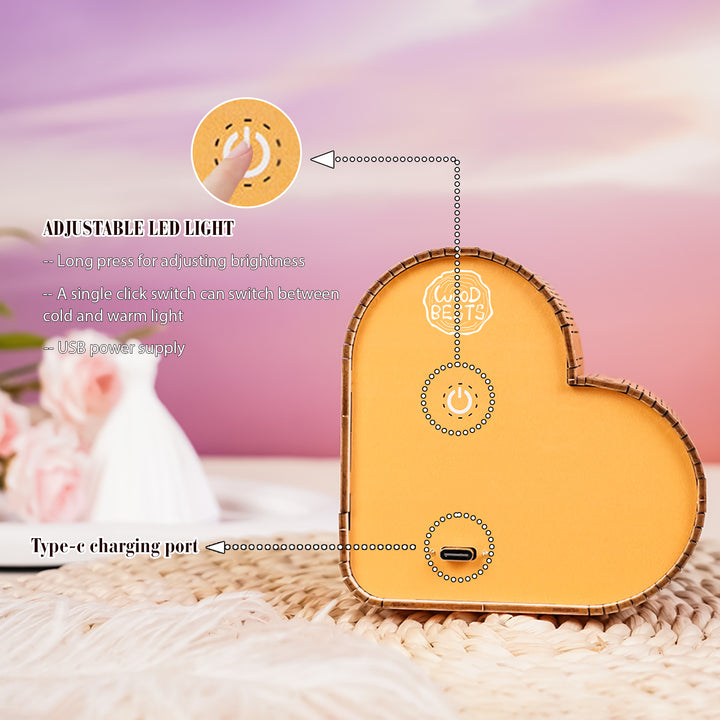 Close-up of the Lovers by the River Kit heart-shaped night light showing adjustable settings and USB charging port.