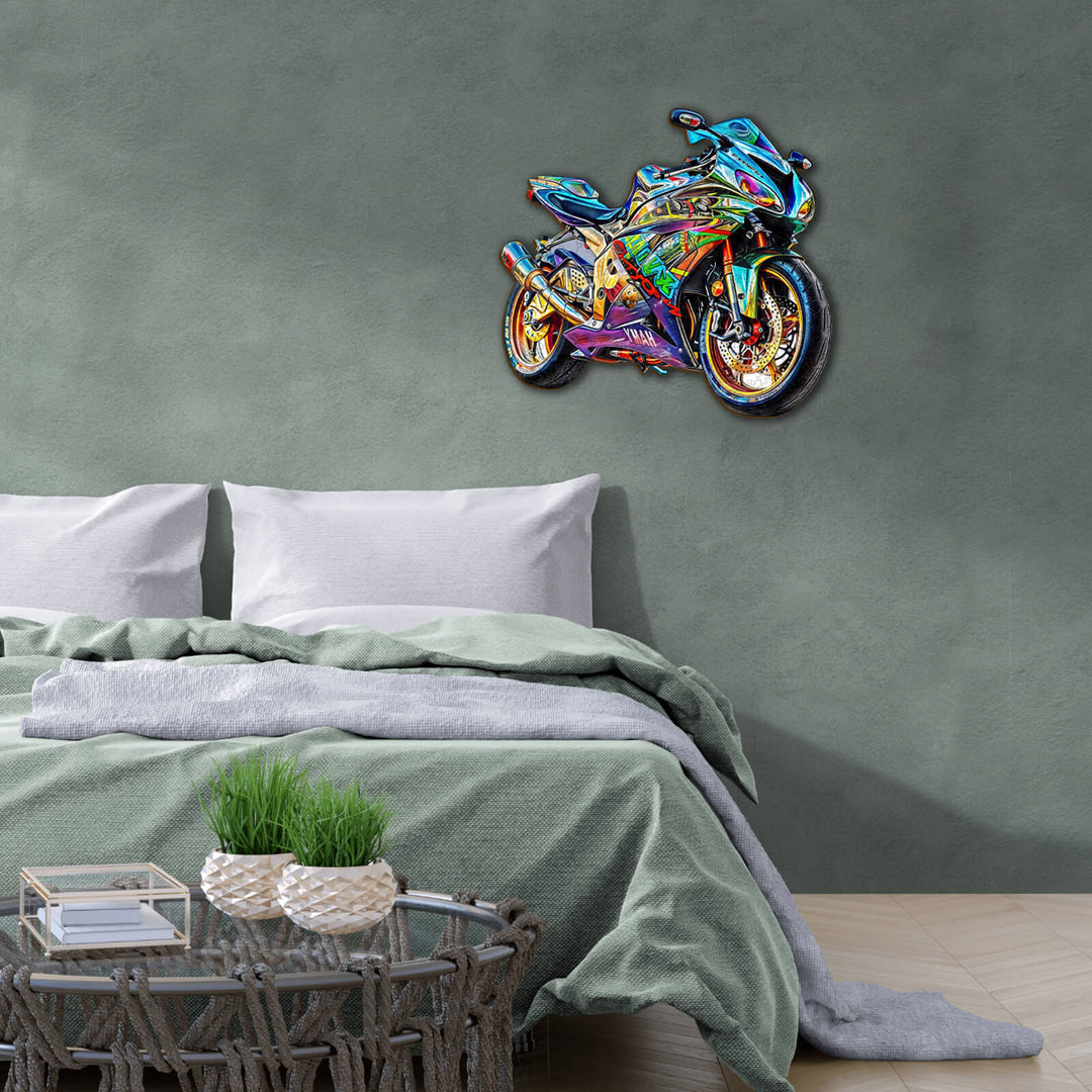 Colorful motorcycle wall art displayed above a cozy bed in a stylish bedroom interior.