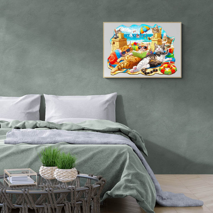 Cozy bedroom featuring a Beach Cat wooden jigsaw puzzle artwork above a neatly made bed, enhancing the room's decor.