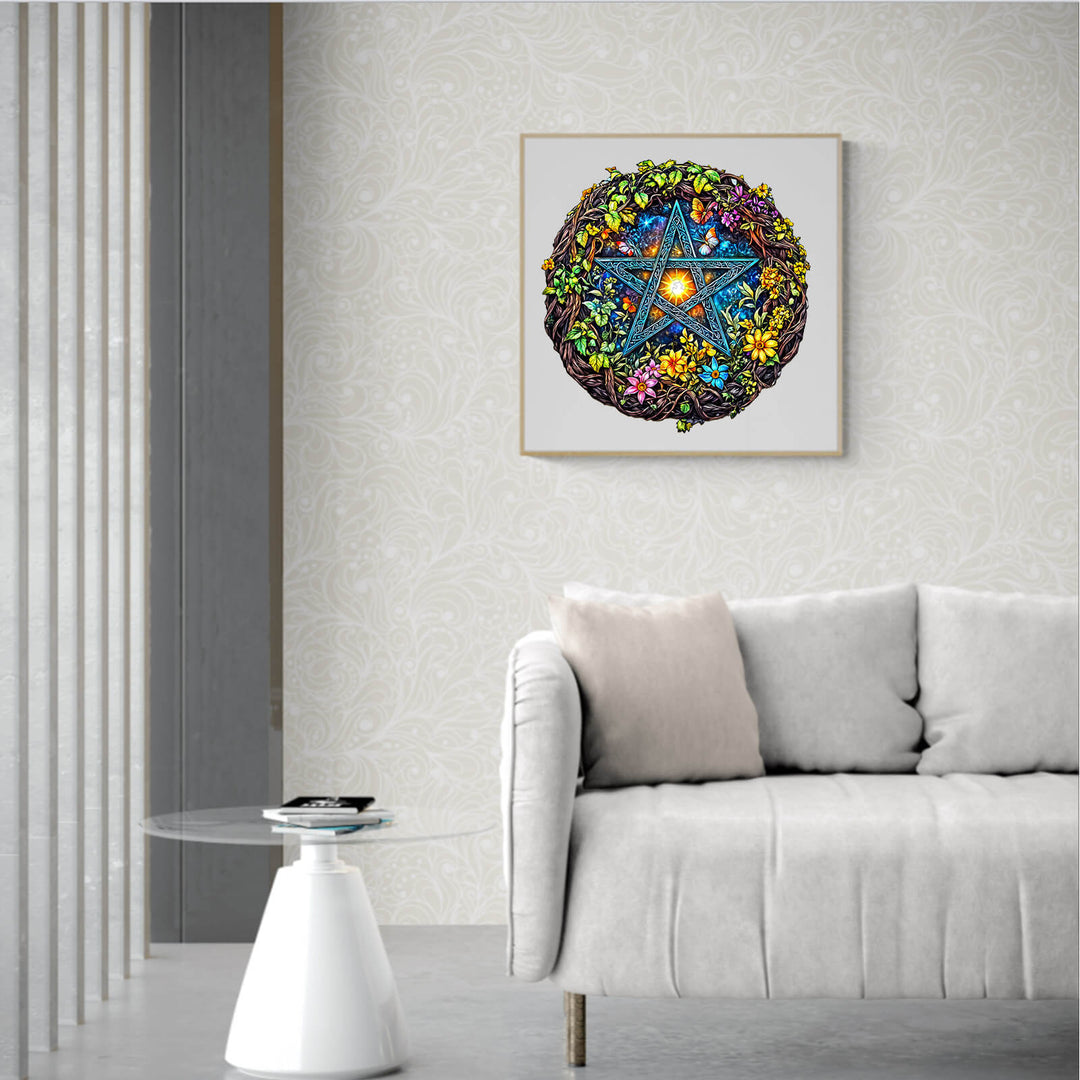 Colorful star mandala artwork in a modern living room setting with light gray sofa and glass side table.