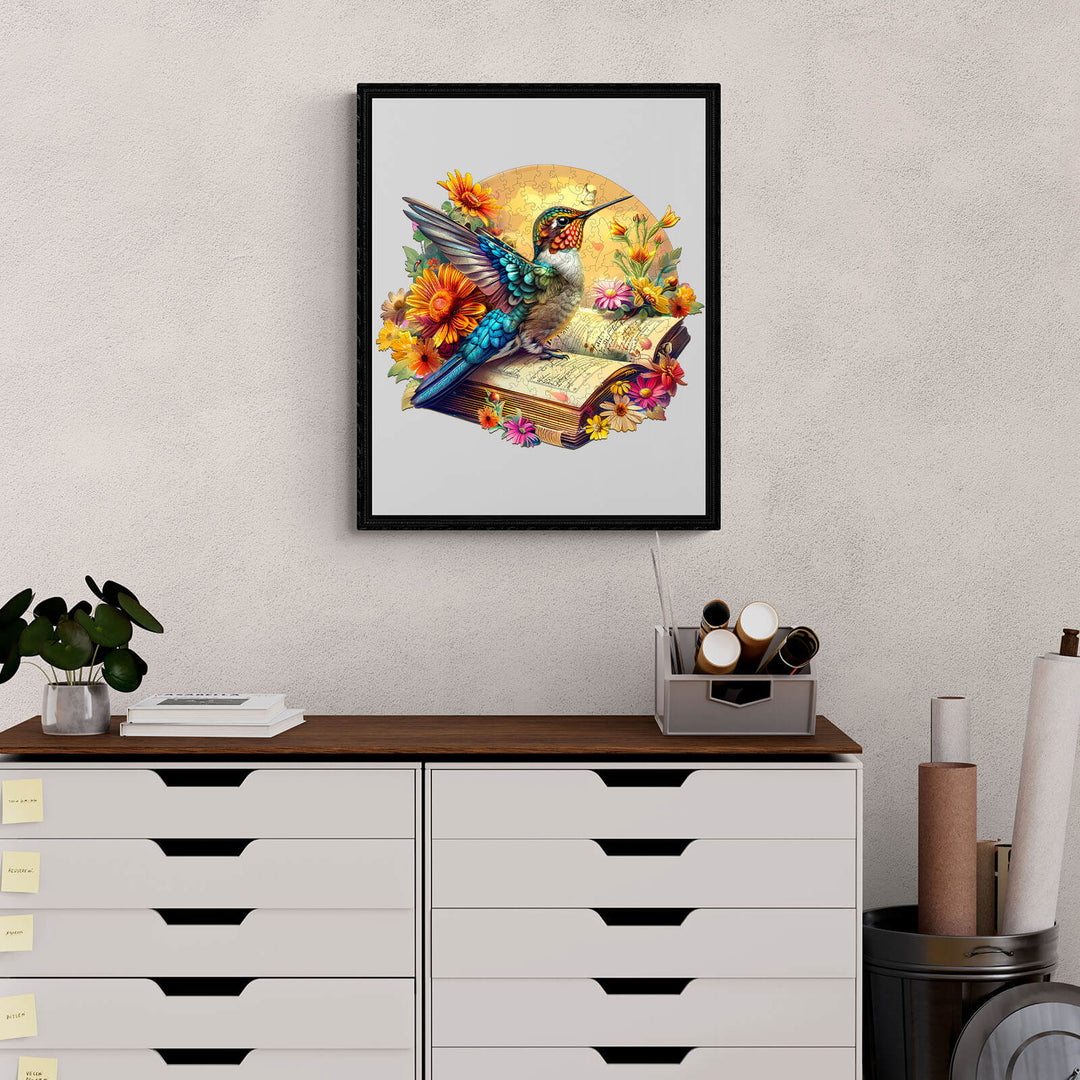 Colorful hummingbird perched on a book surrounded by flowers, ideal for puzzle enthusiasts and mind games lovers.