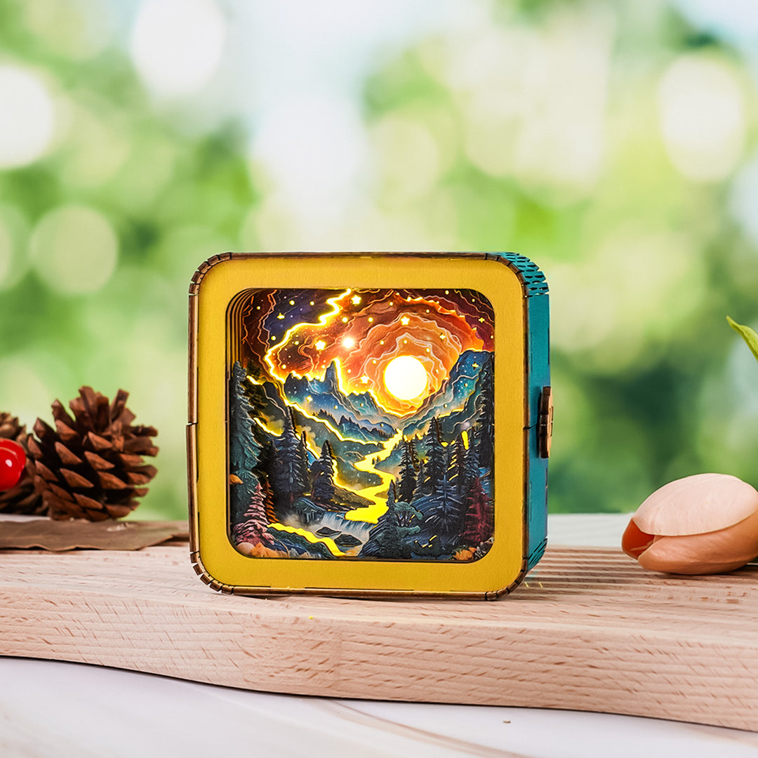 3D wooden puzzle night light featuring a golden river in a forest, glowing under a vibrant sunset.