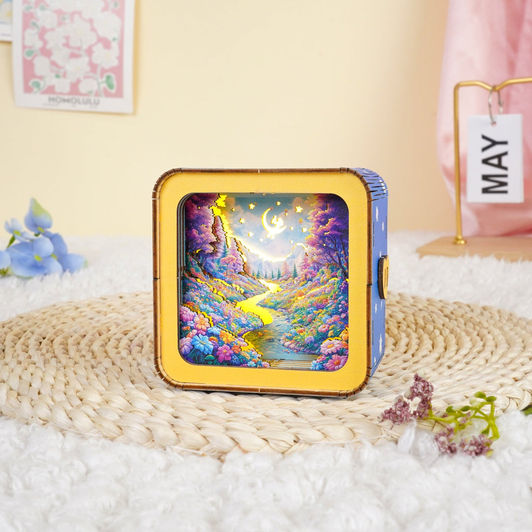 Dream Forest Kit 3D wooden puzzle night light showcasing a vibrant nature scene with a winding river and colorful flowers.