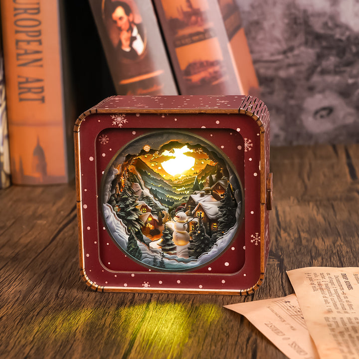 3D wooden puzzle night light featuring a snow mountain hut scene with a snowman and illuminated background.