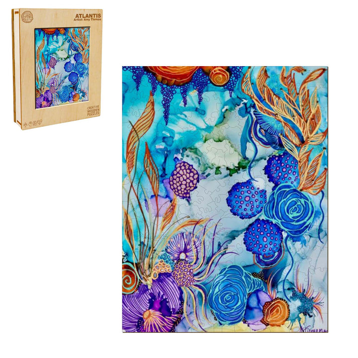 Colorful jigsaw puzzle 'Atlantis' by artist Amy Tieman, featuring vibrant underwater-themed artwork.
