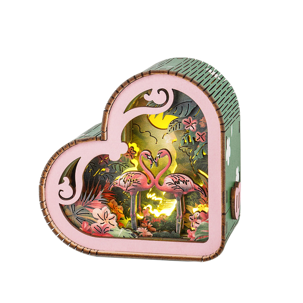 3D wooden puzzle night light featuring a flamingo scene under moonlight, designed in a heart-shaped frame.