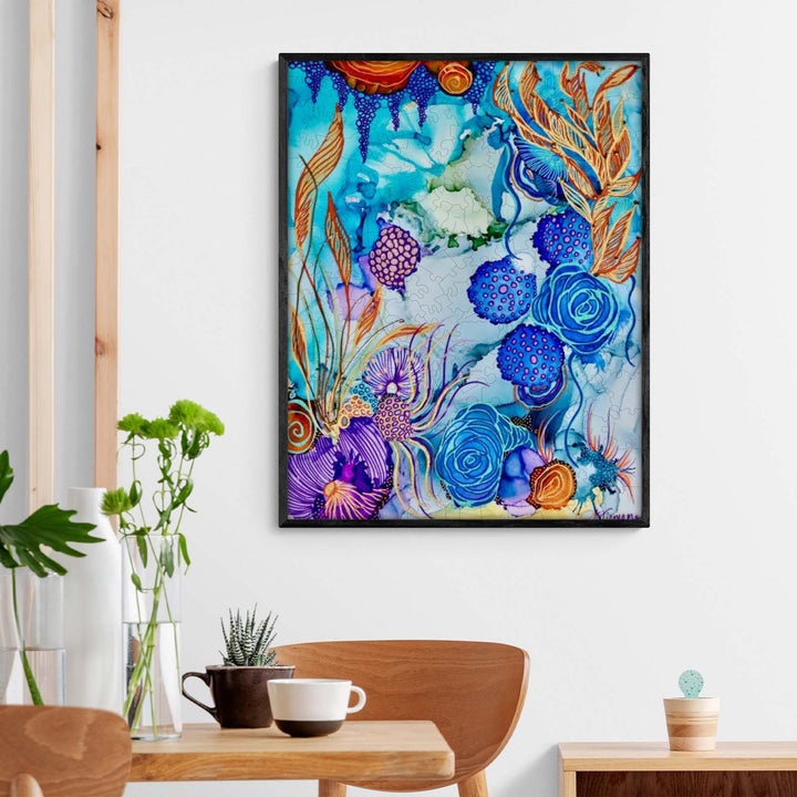 Vibrant abstract watercolor art titled 'Atlantis' by Amy Tieman, showcasing blue and purple flowers and whimsical patterns.