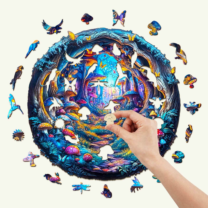 Colorful 3D Magic Mushroom wooden jigsaw puzzle being assembled with a hand placing a piece, featuring intricate woodland design.