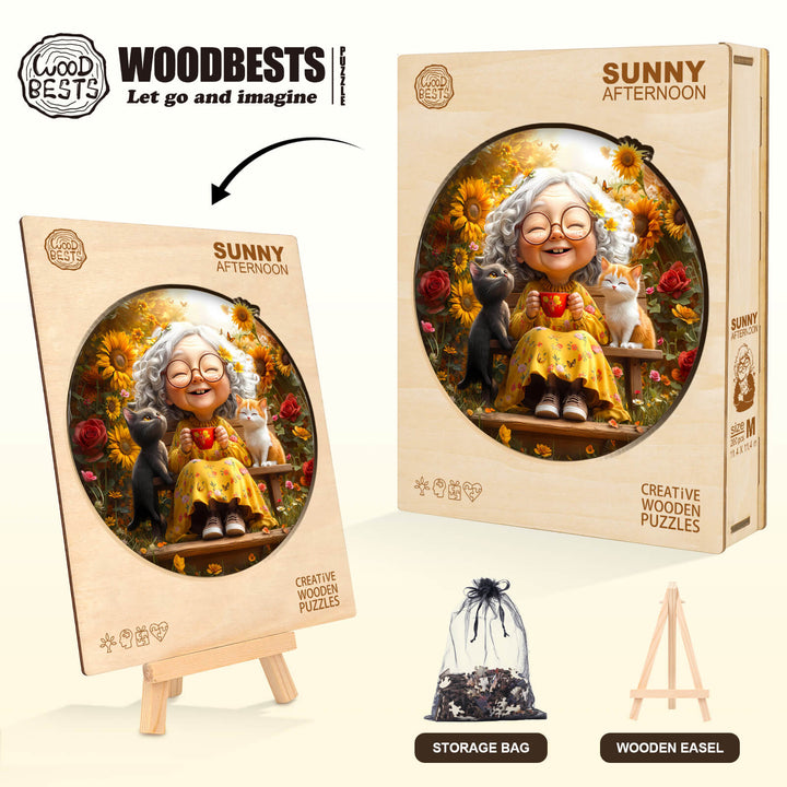 Sunny Afternoon wooden jigsaw puzzle featuring a joyful elderly woman with cats, surrounded by sunflowers, displayed with storage bag and easel.