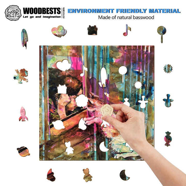 Hand placing colorful wood shapes on an artistic basswood board by WoodBests, promoting creativity and eco-friendly materials.