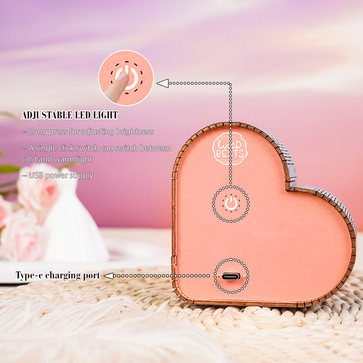 Heart-shaped LED night light with adjustable brightness, USB power supply, and Type-C charging port.