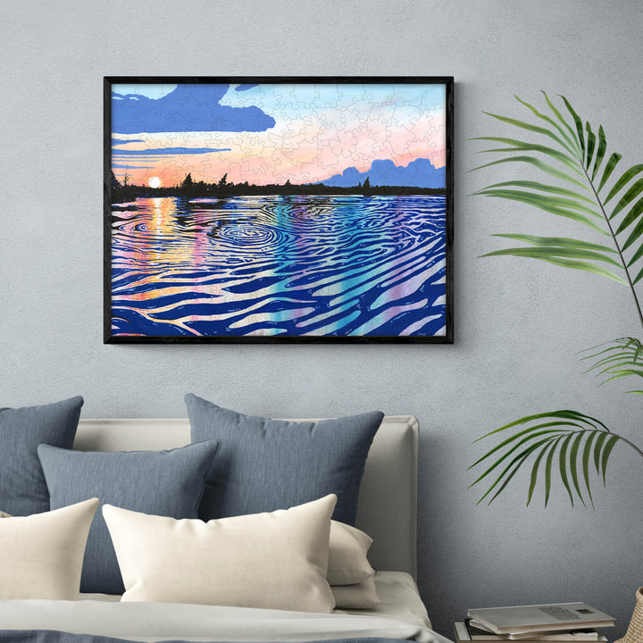 Black Rapids View by Sarah Bradfield, framed artwork featuring colorful water reflections at sunset.