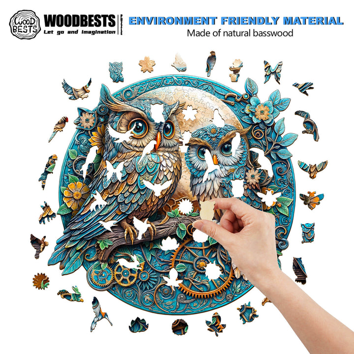 Person placing a piece in an Embossed Owl wooden jigsaw puzzle made from natural basswood.