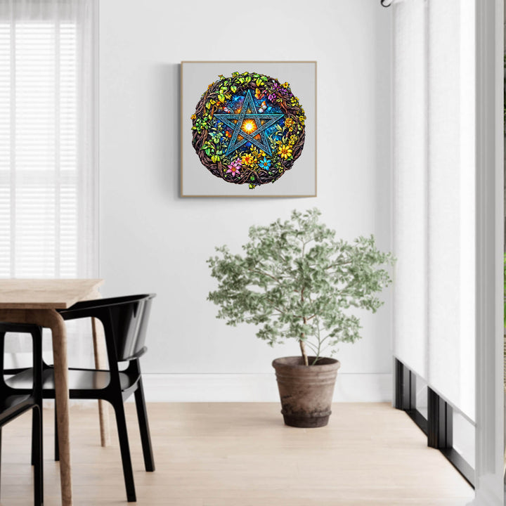 Colorful starburst artwork displayed in a bright room with natural light and a potted plant nearby.