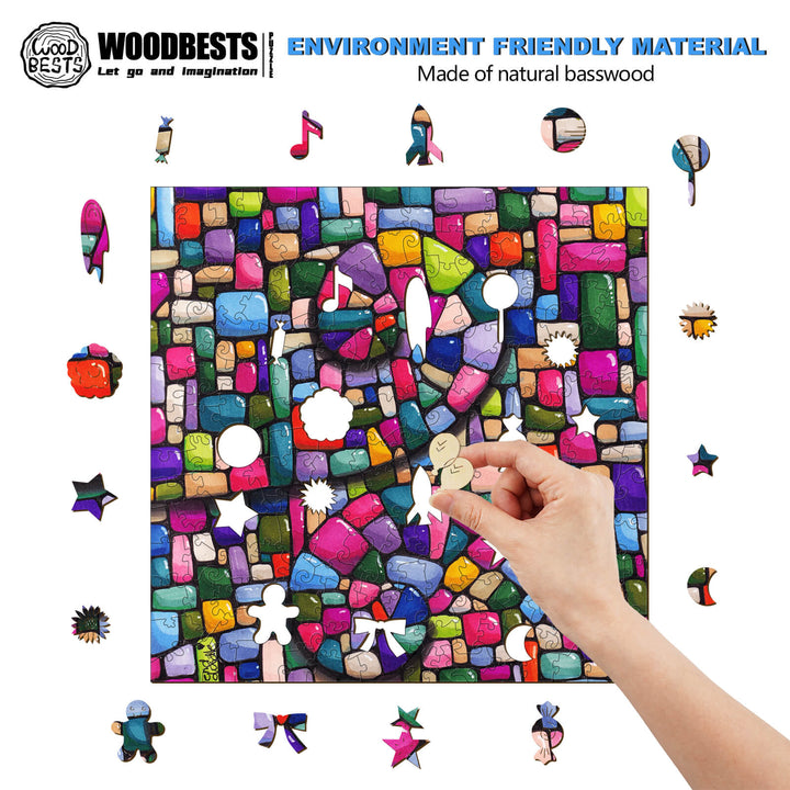 Hand placing a piece in a colorful basswood puzzle made of environmentally friendly materials.