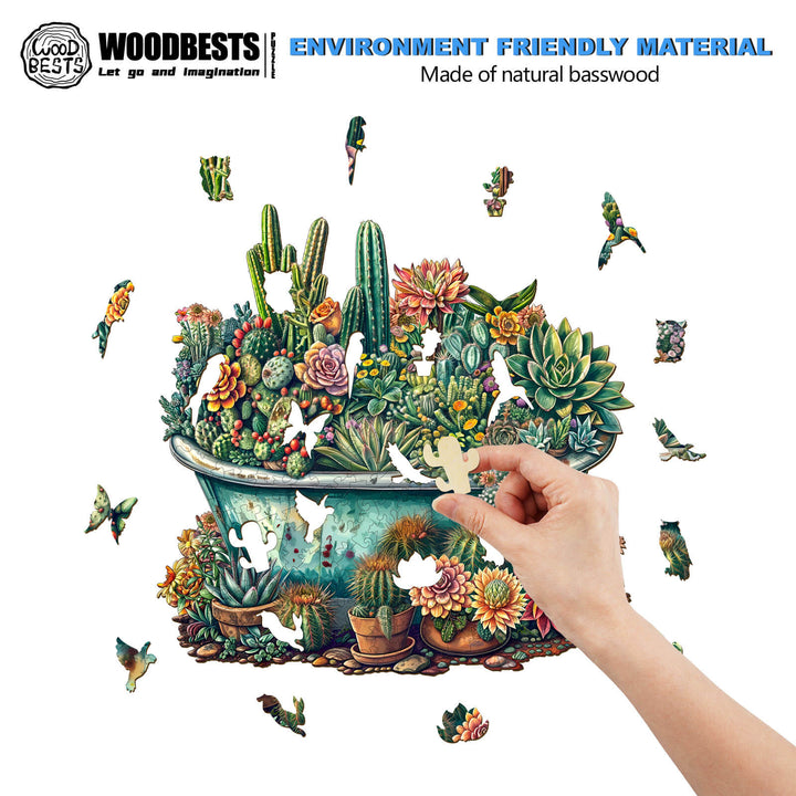 Hand assembling a SEEK AND FIND MANTISES jigsaw puzzle made of natural basswood, featuring vibrant succulent plants.