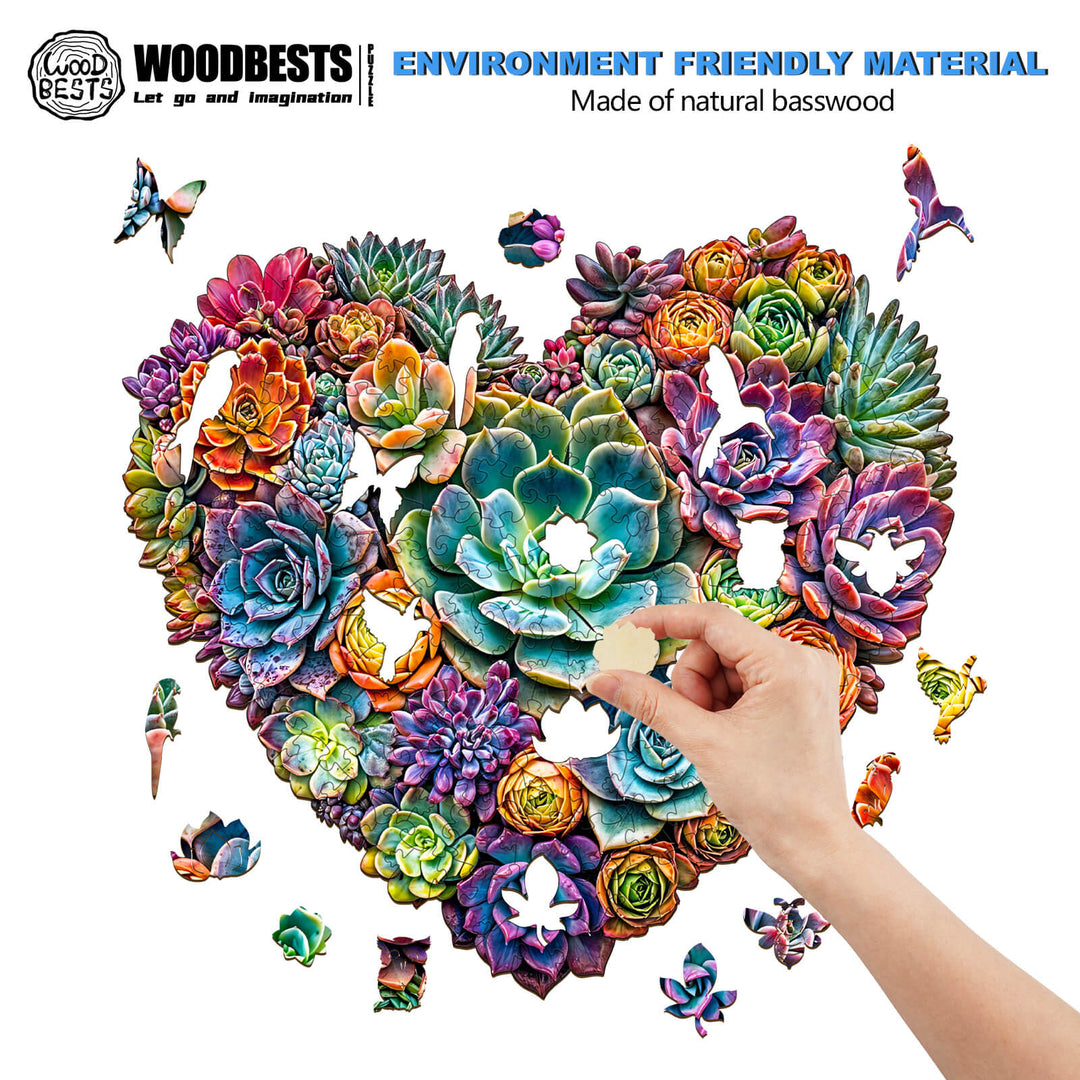 Close-up of a hand placing a piece in a Heartfelt Succulents wooden jigsaw puzzle, showcasing vibrant succulents design.