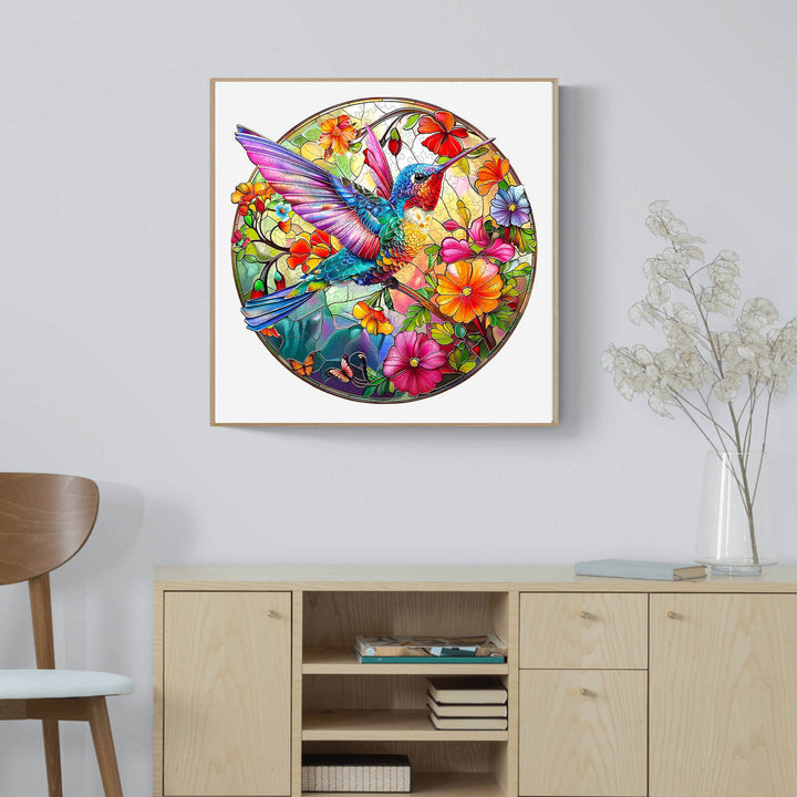 Vibrant stained glass hummingbird jigsaw puzzle artwork with colorful flowers, perfect for decor and puzzle enthusiasts.