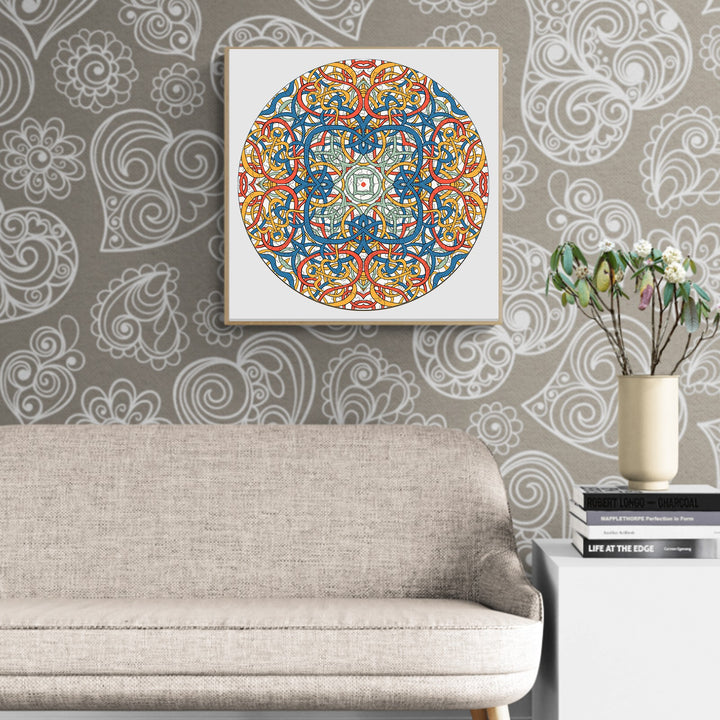 Mandala Celtic Chaos by Lori Anne McKague, framed artwork on wall above a modern sofa with doodle patterns.
