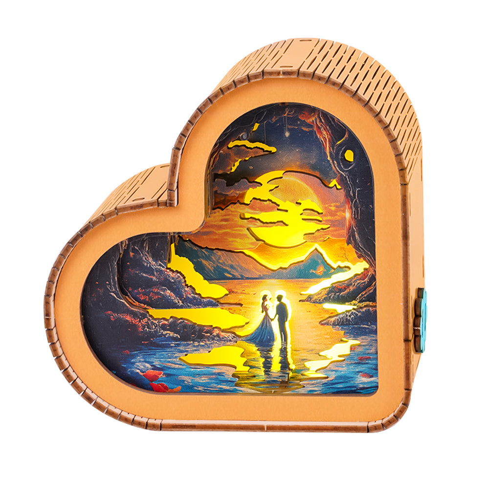 Heart-shaped 3D wooden puzzle night light featuring a romantic silhouette by a river at sunset.